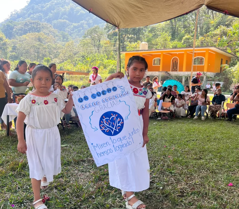 Community-Event-Children-Holding-Sign.webp